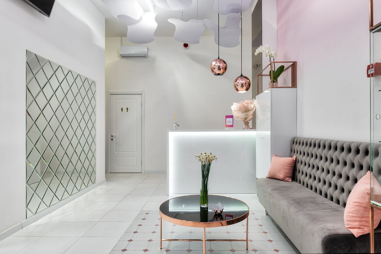 Serenity Spa reception with warm lighting