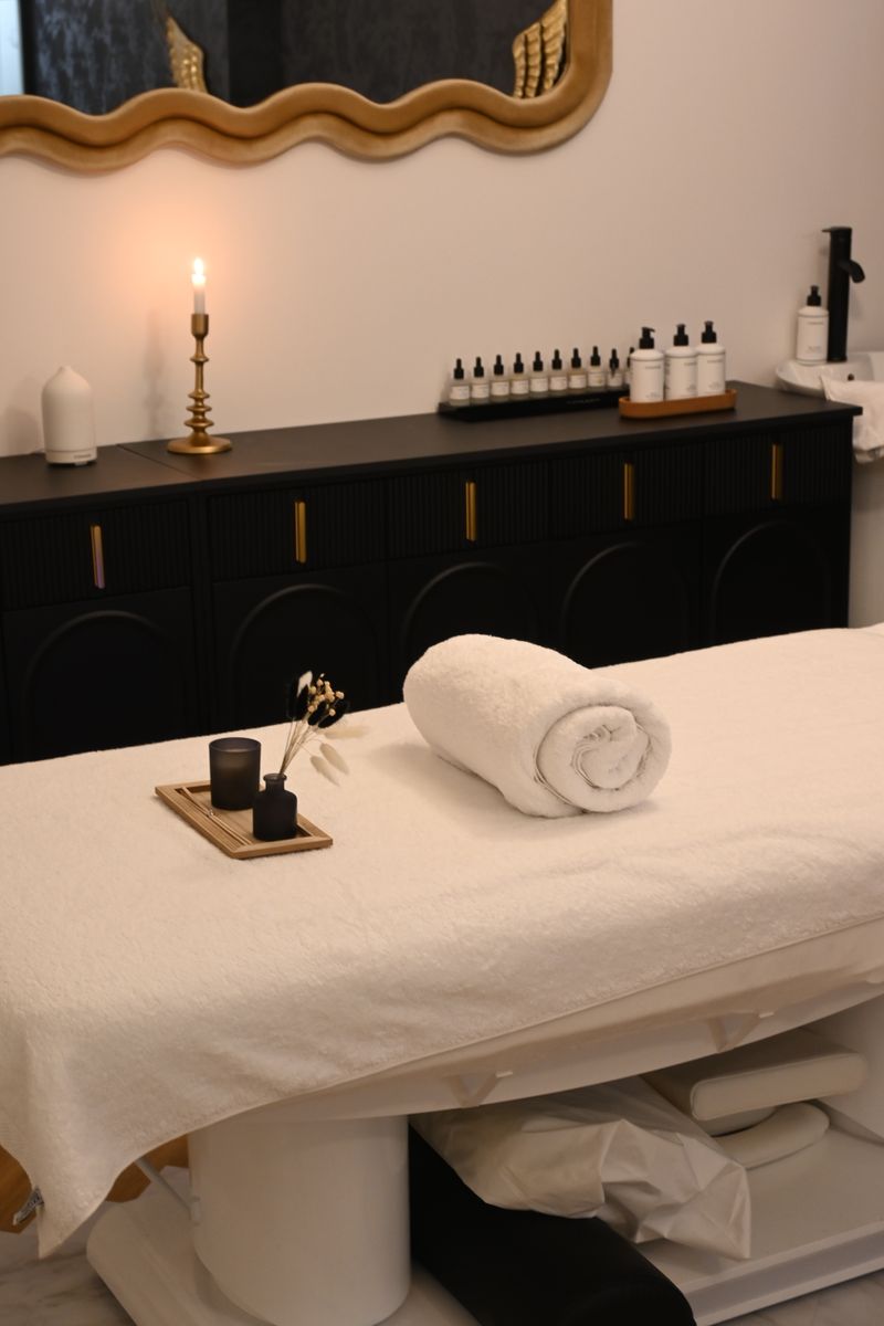A softly lit spa treatment room